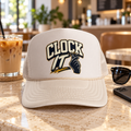 Cream Clock It foam trucker hat with navy and gold graphic